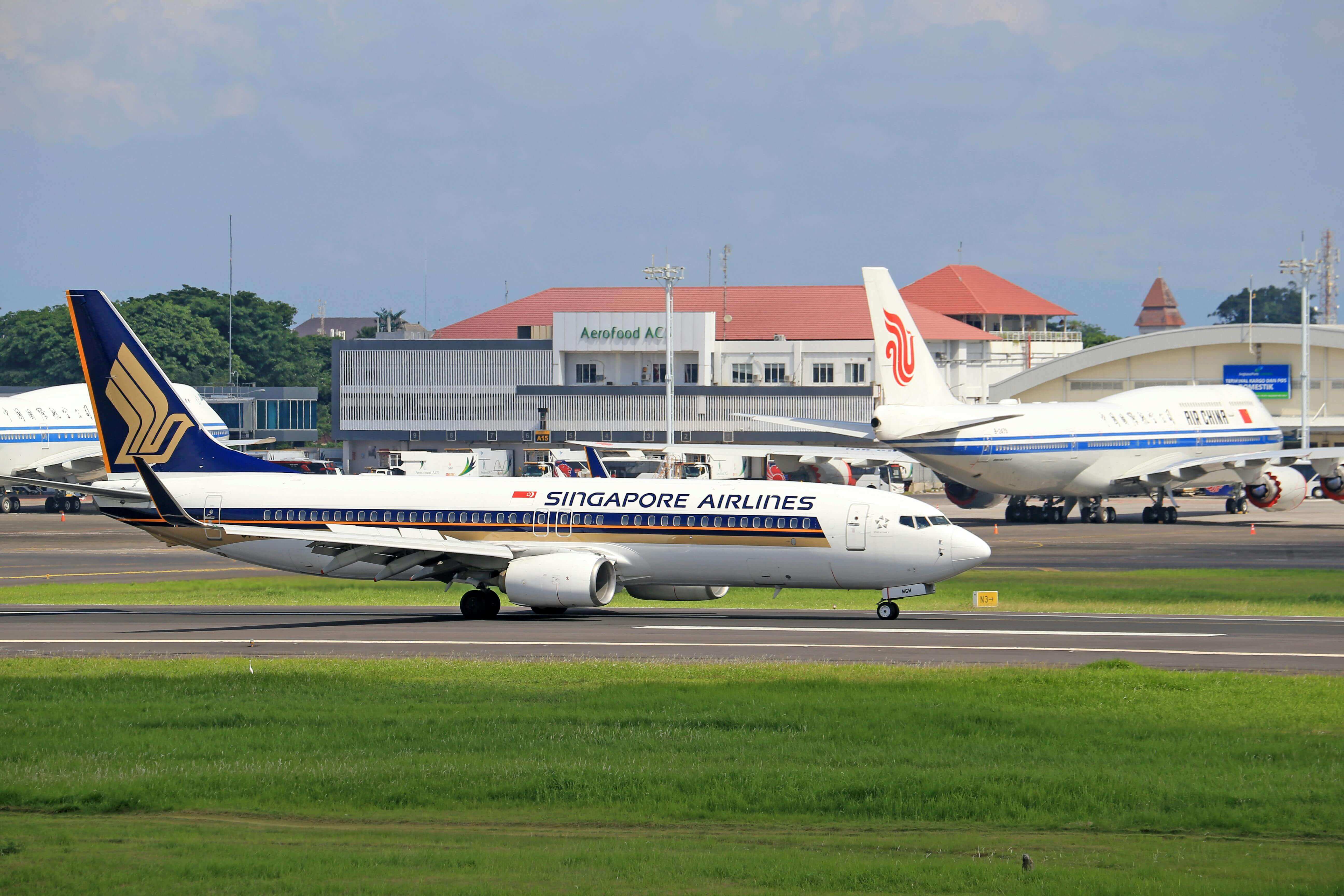 Airport taxi pickup with sedan